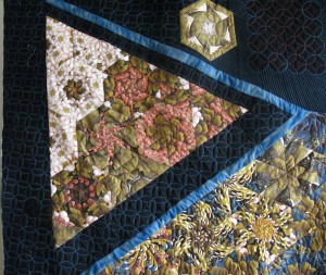 Jennie quilt floating triangle